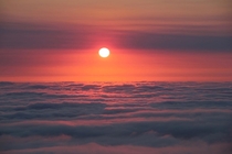 Sunrise after bike-camping over North California fog