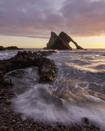 Sunrise at Bow Fiddle Rock on the north-eastern coast of Scotland 