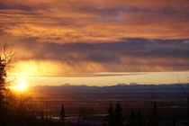 Sunrise behind the Alaska Range 