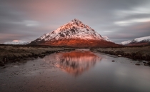 Sunrise looking up the icy river Etive towards Buachaille Etive Mr and the  ft peak of Stob Dearg in Scotland  Photo by Dave Holder