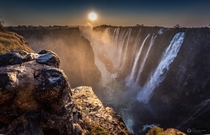 Sunset at the Victoria Falls ZambiaZimbabwe the worlds largest sheet of falling water  photo by Juan Ramn Jimnez