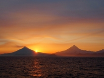 Sunset behind an active volcano from Unimak Pass Alaska 