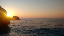 Sunset looking out onto the Ionian sea from Myrtos Beach Kefalonia The Greek Islands 