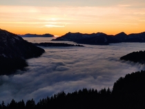 Sunset over a fog-filled valley Avoriaz French Alps 