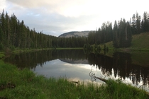 Sunset over a small nameless lake in the West Elks Colorado 
