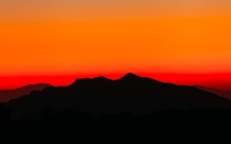 Sunset over Carefree AZ mountain range 