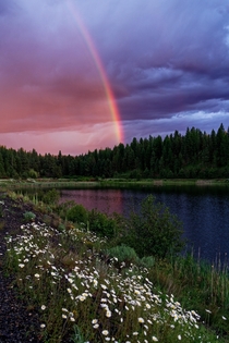 Sunset Rainbow over a small lake in the Malheur National Forest Oregon