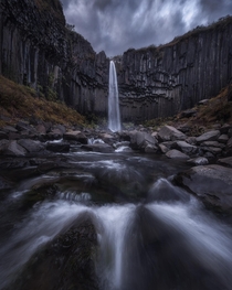 Svartifoss waterfall on a stormy day in Iceland  Insta seanhphotography