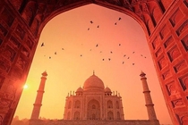 Taj Mahal seen from entrance by sunrise