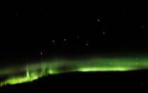 Taken ft in the sky of the big dipper underlined by the Aurora Borealis 