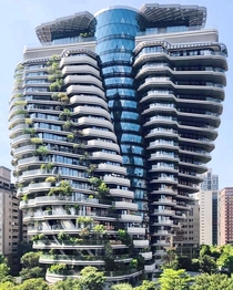 Tao Zhu Yin Yuan tower located in Taipei is an eco-designed energy-conserving and carbon-absorbing green building