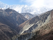 The Annapurna massif and scree slopes near Tilicho Peak Nepal 