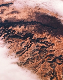 The clouds parted at just the right spot over Glen Canyon Utah during my flight 