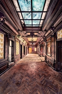 The corridor of a derelict mansion  Photographed by Benjamin Wiessner