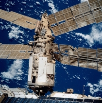 The damaged solar arrays of the Spektr module of the Mir space station after an unmanned Progress spacecraft hit the station during a manual docking test in  The Progress ship punctured the module which had to be permanently sealed off 