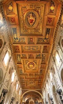 The decorated ceiling of the Papal Archbasilica of Saint John Lateran in Rome Italy