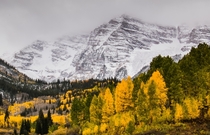 The dramatic Maroon Bells in Colorado during a fall snow dusting 