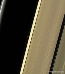 The Earth and our Moon imaged through Saturns Rings