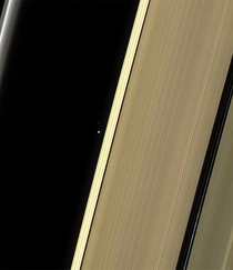 The Earth and The Moon as seen through Saturns rings