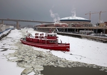 The Edward M Cotter oldest active fire boat in the world traveling up the icie Buffalo River 