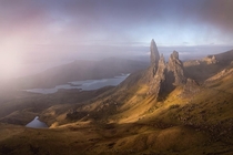 The famous Old Man of Storr appearing through the clouds 
