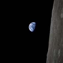 The first earthrise photography taken by Bill Anders in  digitally restored by the Earth Restored project link in comments