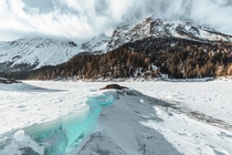 The frozen Obernberger Lake in Tyrol Austria 