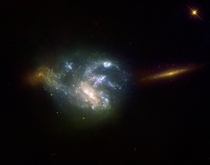 The galaxy NGC  is located in the constellation of Pegasus at an approximate distance of  million light-years This picture is composed of three images obtained with Hubbles Wide Field Planetary Camera 