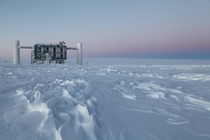 The IceCube Lab in the setting sun at the Amundsen-Scott South Pole Station in Antarctica 
