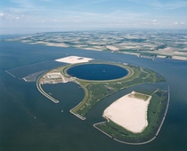 The IJsseloog IJssel eye is an artificial island in the Ketelmeer province of Flevoland the Netherlands used as a depository to store polluted silt Most of the polluted silt was deposited in the Ketelmeer by the IJssel river between  and  