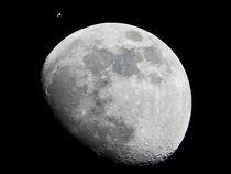 The International Space Station can be seen as a small object in the upper left of this image of the moon in the skies over the Houston area flying at an altitude of  kilometers January   