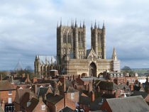 The Lincoln cathedral in the UK is an absolute beast It started construction in  and finished  was designed by Alexandet the mason is  meters tall and is around a whopping k square meters of floor space Its designed in english gothic and is famous for the