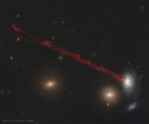 The Long Gas Tail of Spiral Galaxy D
