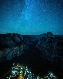 The Milky Way and Andromeda galaxy rising over Half Dome and Yosemite Village 