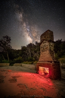 The Milky Way and the remains of an abandoned building burned down in the massive  Cedar Fire San Diego County 