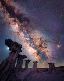 The Milky Way rises over limestone formations in California 