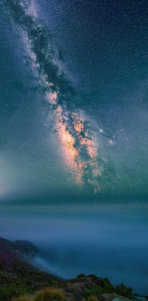The Milky Way Soaring Over Undercast Skies on the Big Sur Coast of California 
