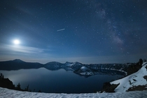 The moon and Milky Way rising over Crater Lake National Park Oregon USA 