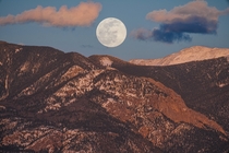 The Moon rising over the Sangre de Cristo Mountains 
