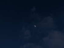 The moon through a thin layer of clouds