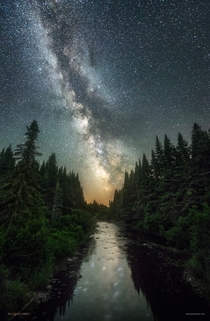 The night sky above the Connecticut River in Pittsburg New Hampshire 