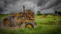 The old yellow tractor  by Brad MacDuff