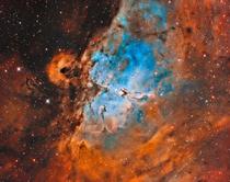 The pillars of creation surrounded by the eagle