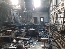 The remains of a burnt decrepid workshop of sorts