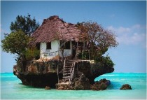 The Rock Restaurant in Zanzibar Tanzania can be reached both on foot and by boat depending on the tide 