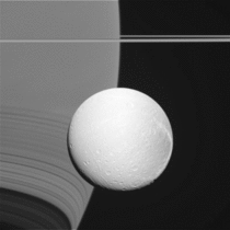 The same shot of Dione and Saturn but instead animated to show the parallax between the frames Credits NASA JPL-Caltech Space Science Institute Cassini Imaging Team
