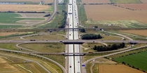 The Schkeuditzer Kreuz was the first of many cloverleafs in Germany opening in  It forms the Junction between Autobahns  and  and was the first freeway interchange in Europe In  it was modified with a flyover ramp