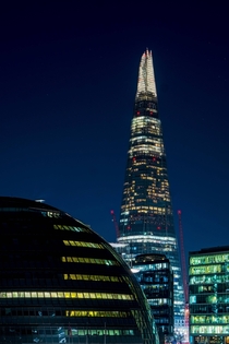 The Shard and Londons City Hall in the evening 
