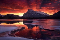 The Sky is on Fire Banff National Park in Canada Photo by Marc Adamus 
