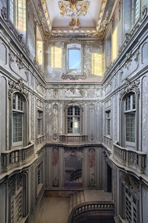 The stair hall of a derelict palace  by Benjamin Wiener